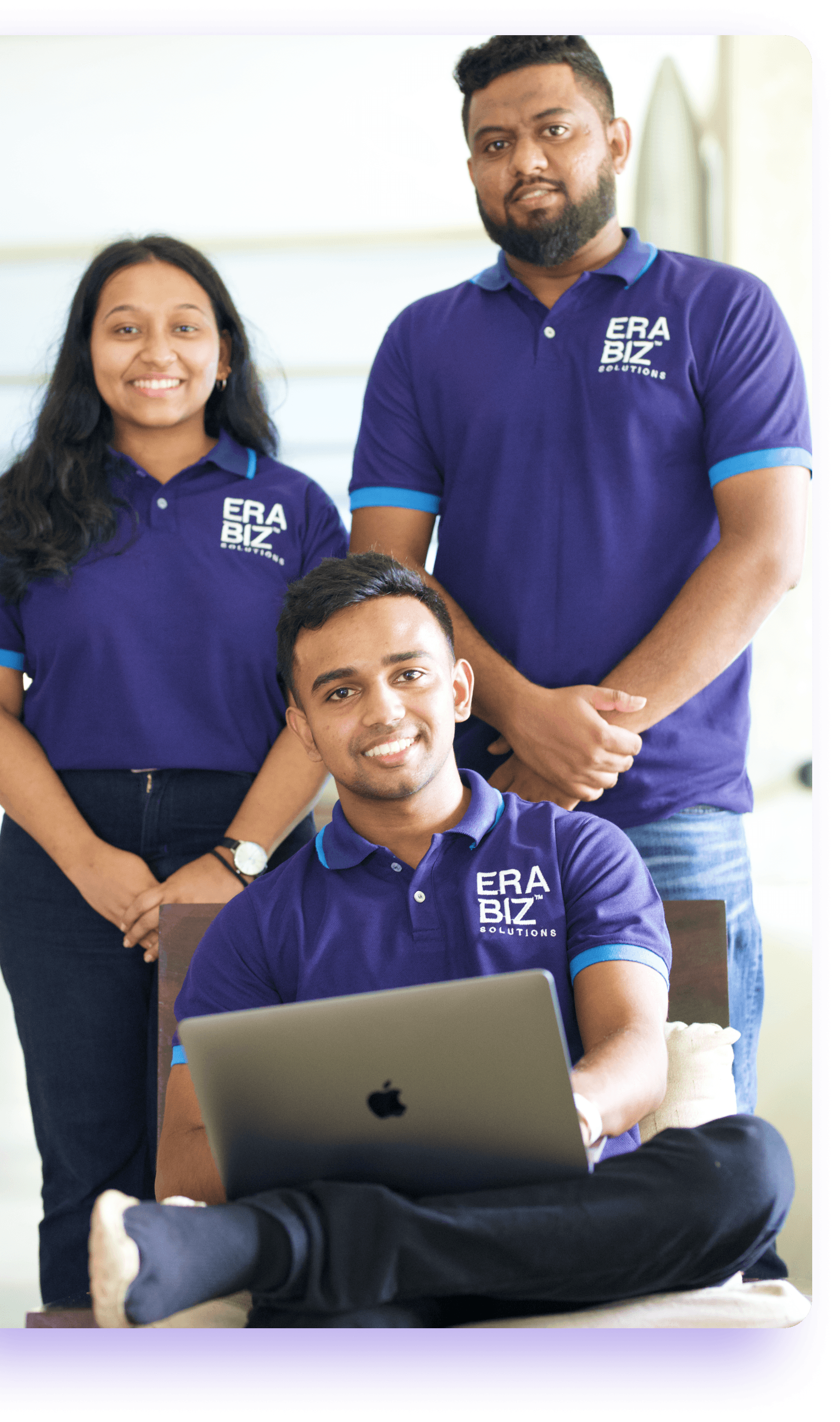 Three team members from Era Biz Offshore software development team discuss project. The teamwork is reflected in their eyes as check their coding. Offshore software development in Sri Lanka. Outsourcing to Sri Lanka